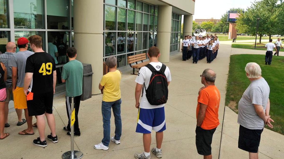 The Penn State Blue Band performs for people in line to buy Paul McCartney tickets at the Bryce Jordan Center on Aug. 31.