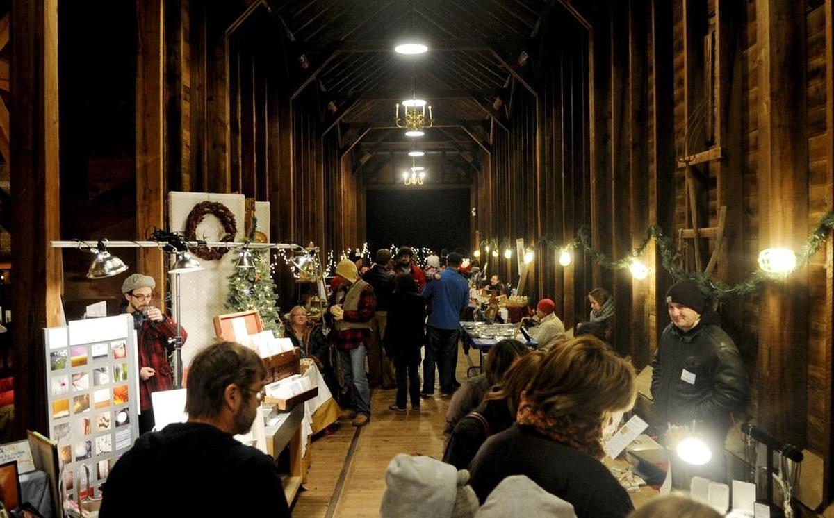 Visitors enjoy crafts and baked goods during the 2013 Christmas in Lemont event, held annually at the Granary.