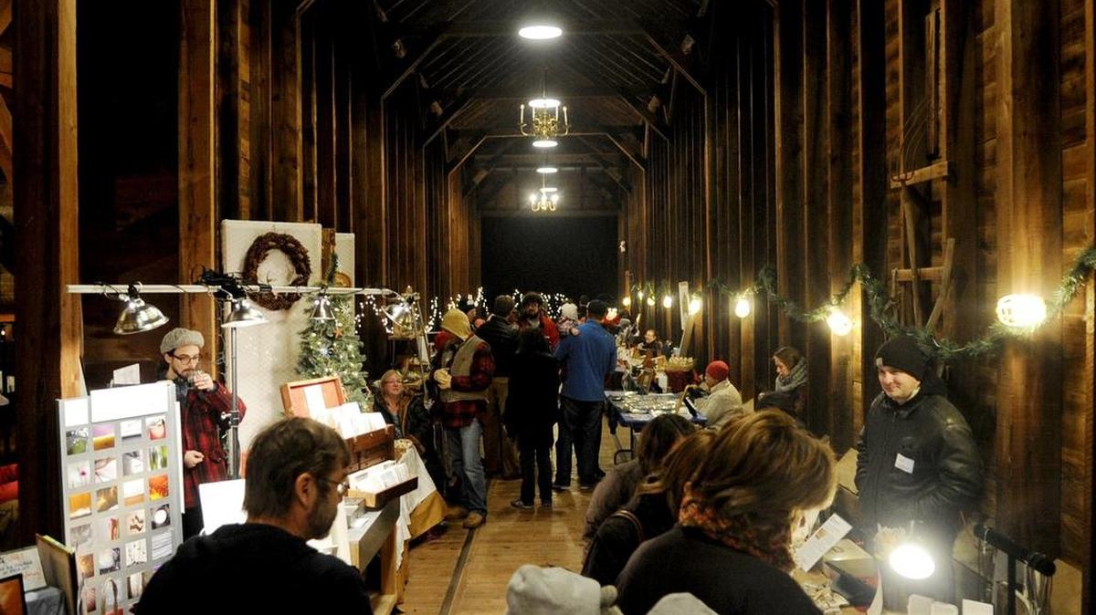 Visitors enjoy crafts and baked goods during the 2013 Christmas in Lemont event, held annually at the Granary.