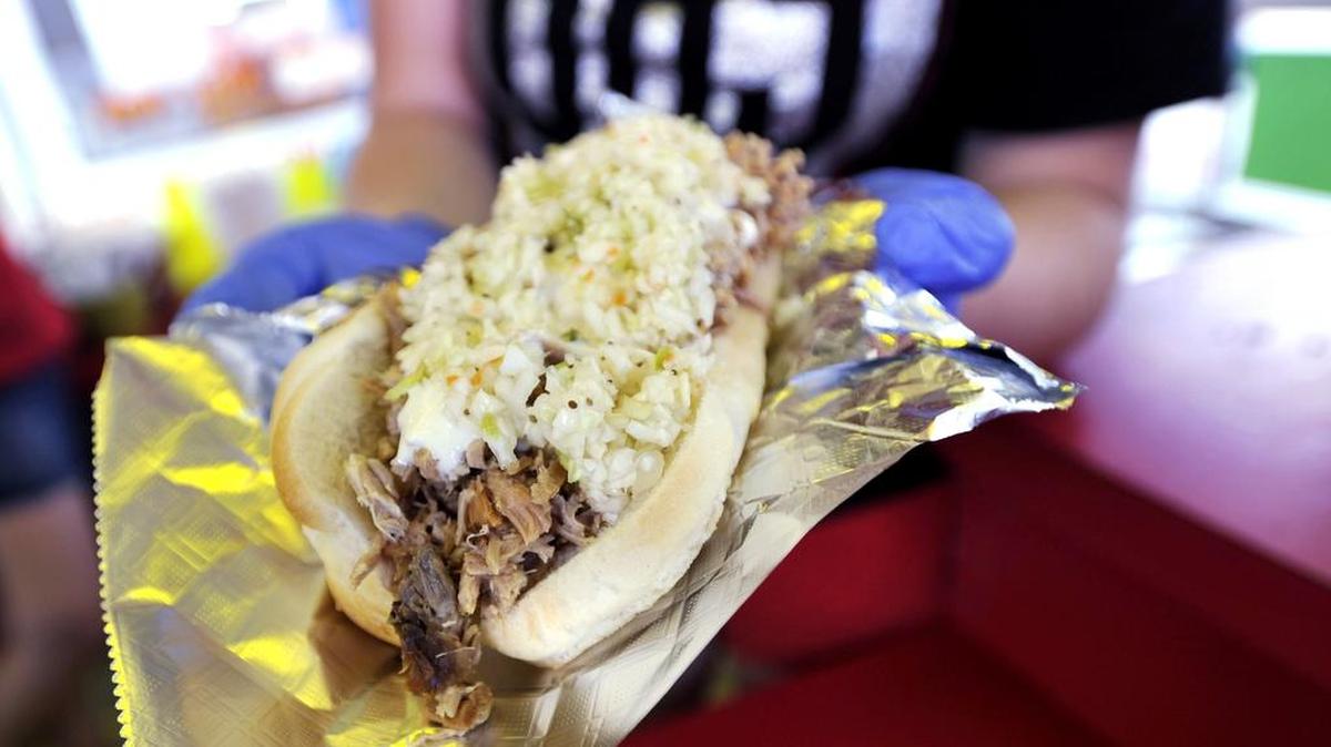 Scott’s Roasting, a Centre County Grange Fair vendor, features pulled pork sandwiches and other items.