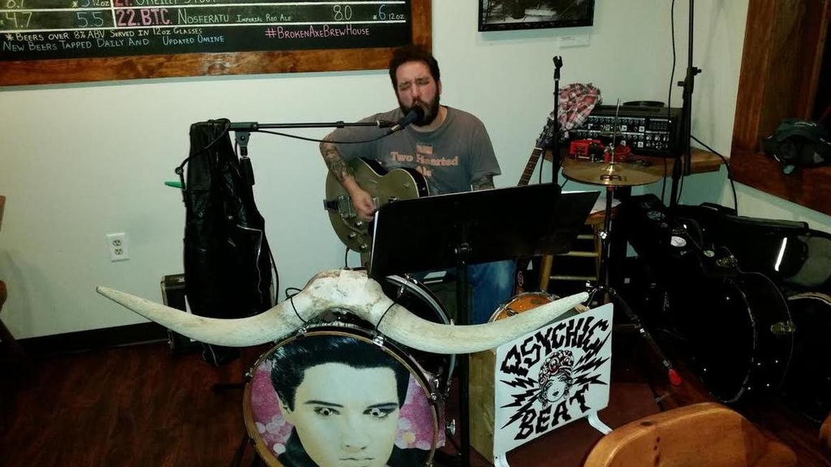 Danny Brumbaugh, of the The Psychic Beat One Man Band, performs at the Broken Axe in Lock Haven.