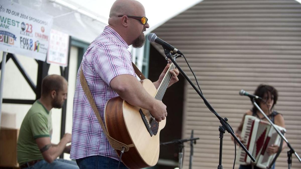 Bill Strayer performs with Josh Troupe on drums and Denise Strayer on accordion during the Summer’s Best Music Fest in 2014.