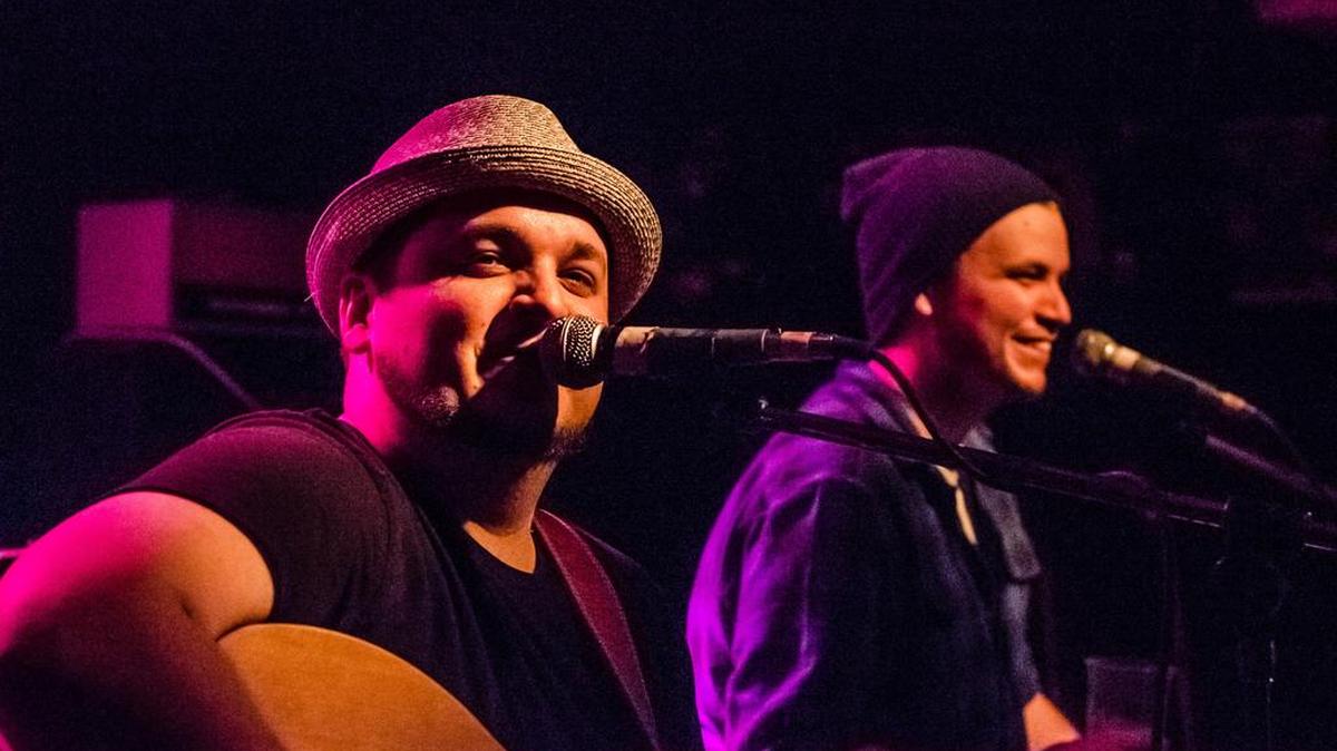 Matt Greer, left, and Tyler Greer perform around Happy Valley as Corner Brothers.