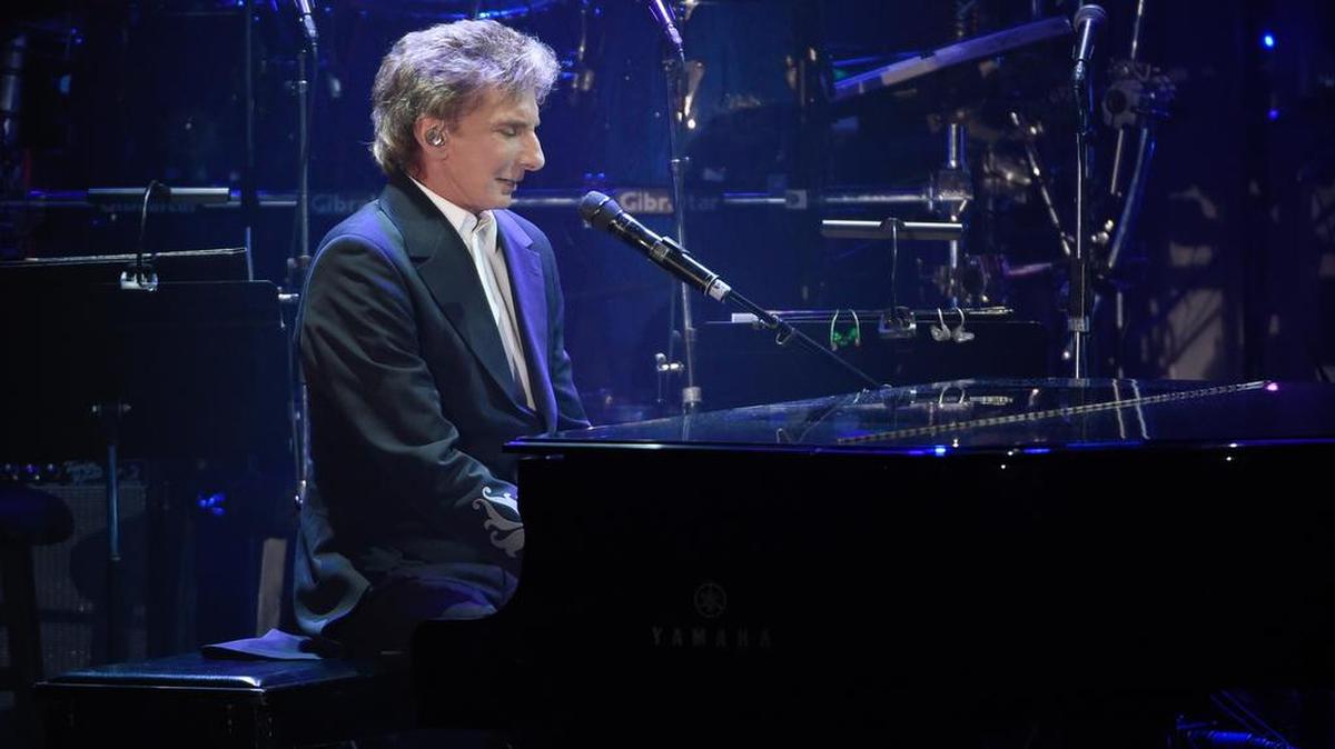 Barry Manilow performs at the Clive Davis Pre-Grammy Gala at the Beverly Hilton Hotel on Feb. 14. The singer-songwriter’s “One Last Time” tour stops at the Bryce Jordan Center on Saturday.