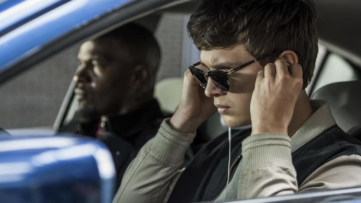 Ansel Elgort, right, and Jamie Foxx star in “Baby Driver.”