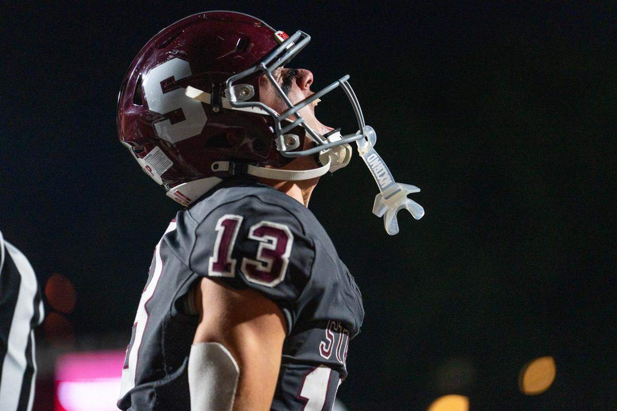 Wide Receiver Hank Lustig celebrates after scoring during a Friday night football game between State College and Chambersburg in State College, Pa., on Friday, Sept. 19, 2025. The Little Lions beat the Trojans 40-0.