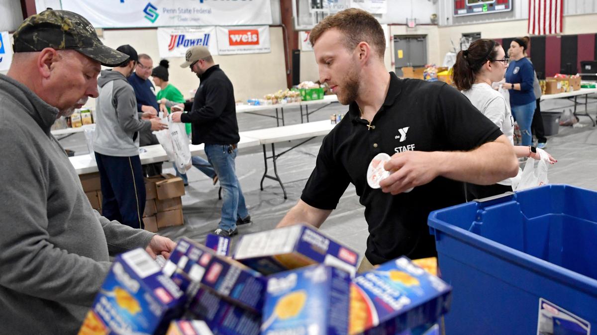 Chris Calliari helps volunteers pack lunches at the Moshannon Valley YMCA in March 2020. The YMCA of Centre County is among 26 agencies that currently make up the Centre County United Way Partner Network.