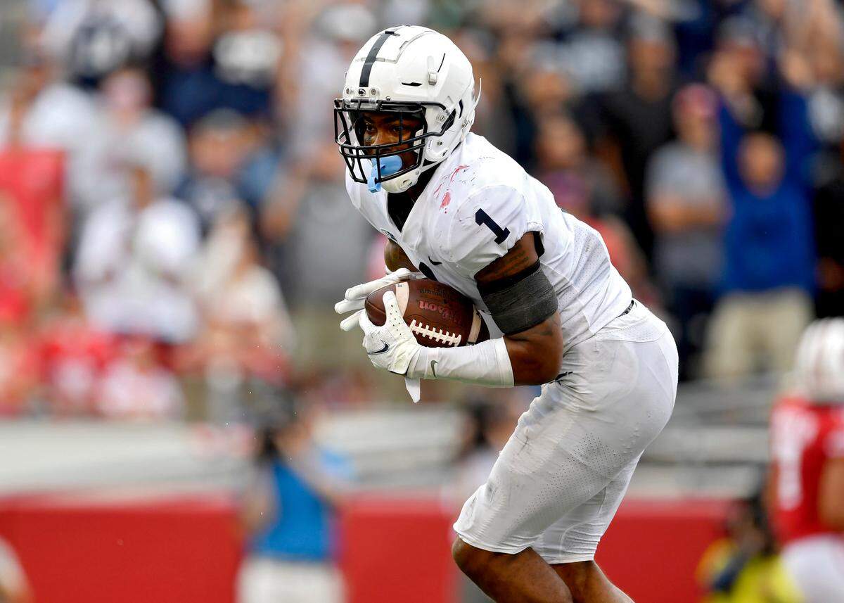 Penn State safety Jaquan Brisker intercepts the ball in the fourth quarter of the game against Wisconsin on Saturday, Sept. 4, 2021 at Camp Randall Stadium.  