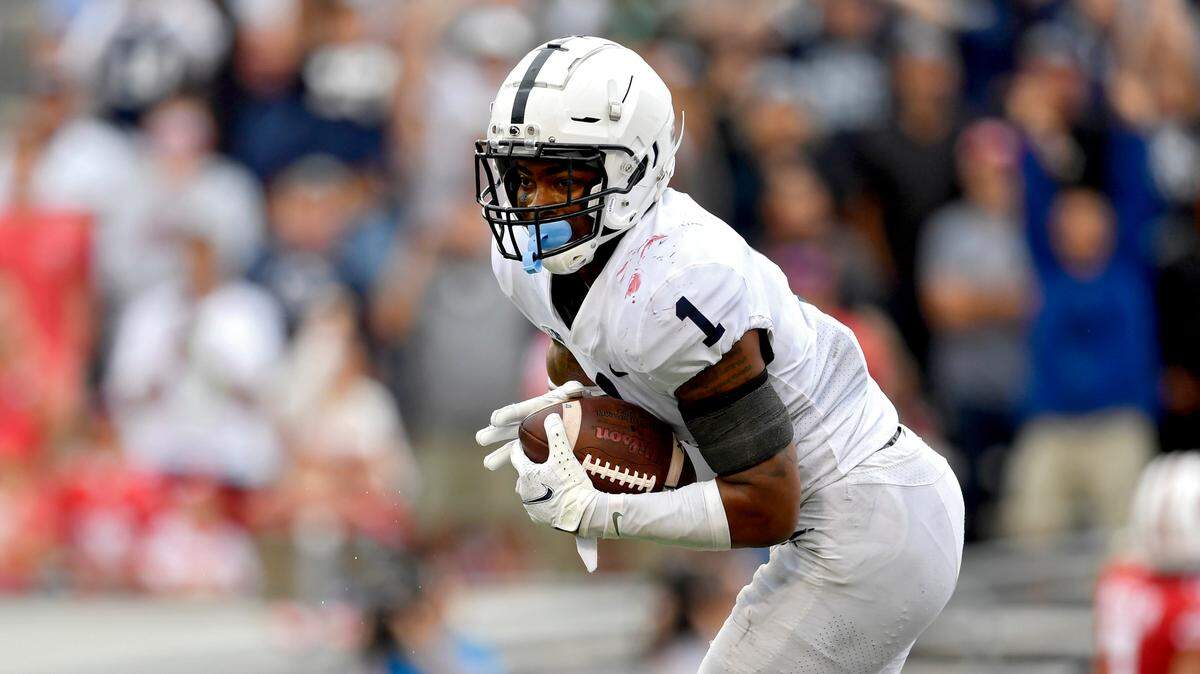 Penn State safety Jaquan Brisker intercepts the ball in the fourth quarter of the game against Wisconsin on Saturday, Sept. 4, 2021 at Camp Randall Stadium.
