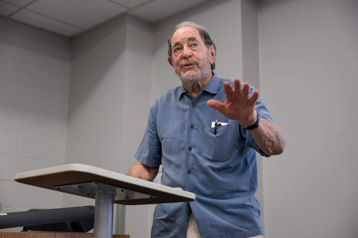 Dr. Ronald Smith speaks to the crowd during a debate over whether college athletes should be paid in University Park, Pa., on Thursday, April 16, 2026. Smith has written several books on intercollegiate athletics. The debate was hosted by Penn State’s College of Health and Human Development.