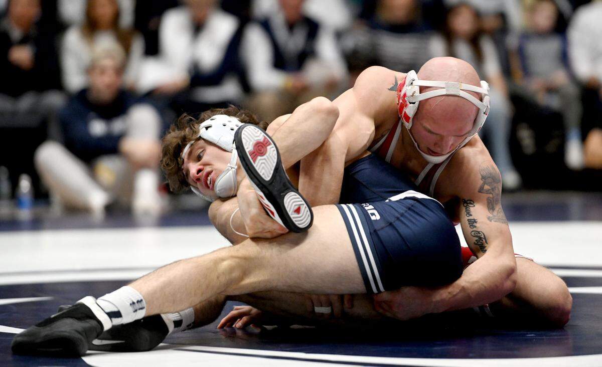 Penn State’s Levi Haines wrestles Nebraska’s Peyton Robb in the 157 lb bout of the match on Sunday, Feb. 18, 2024 in Rec Hall.
