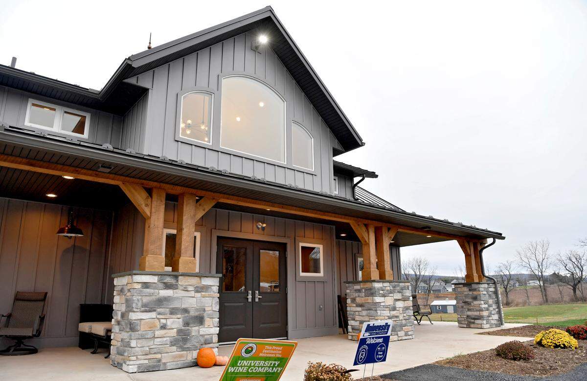 The new home of University Wine Company on Misty Hill Drive in Boalsburg has a tasting room, production facility, outdoor seating and several rows of grape vines.