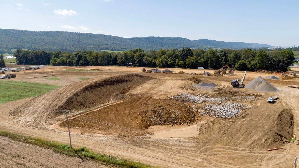 Crews work on the land off of old Cemetery Lane between East College Avenue and Zion Road in Zion on Friday, Sept. 6, 2024.