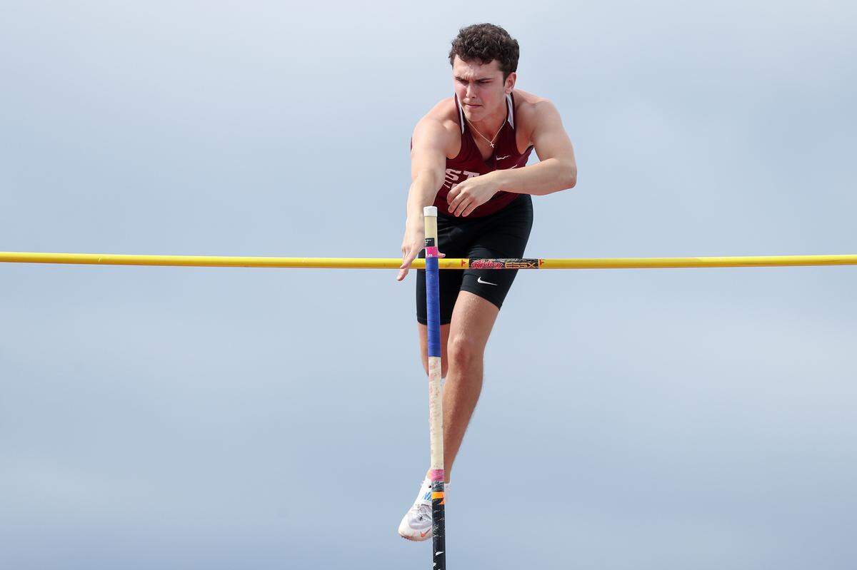 State College’s Ian Dorefice clears the crossbar while competing in the boys Class 3A pole vault finals during the PIAA State Track and Field Championships held Friday at Seth Grove Stadium on the Shippensburg University campus in Shippensburg.