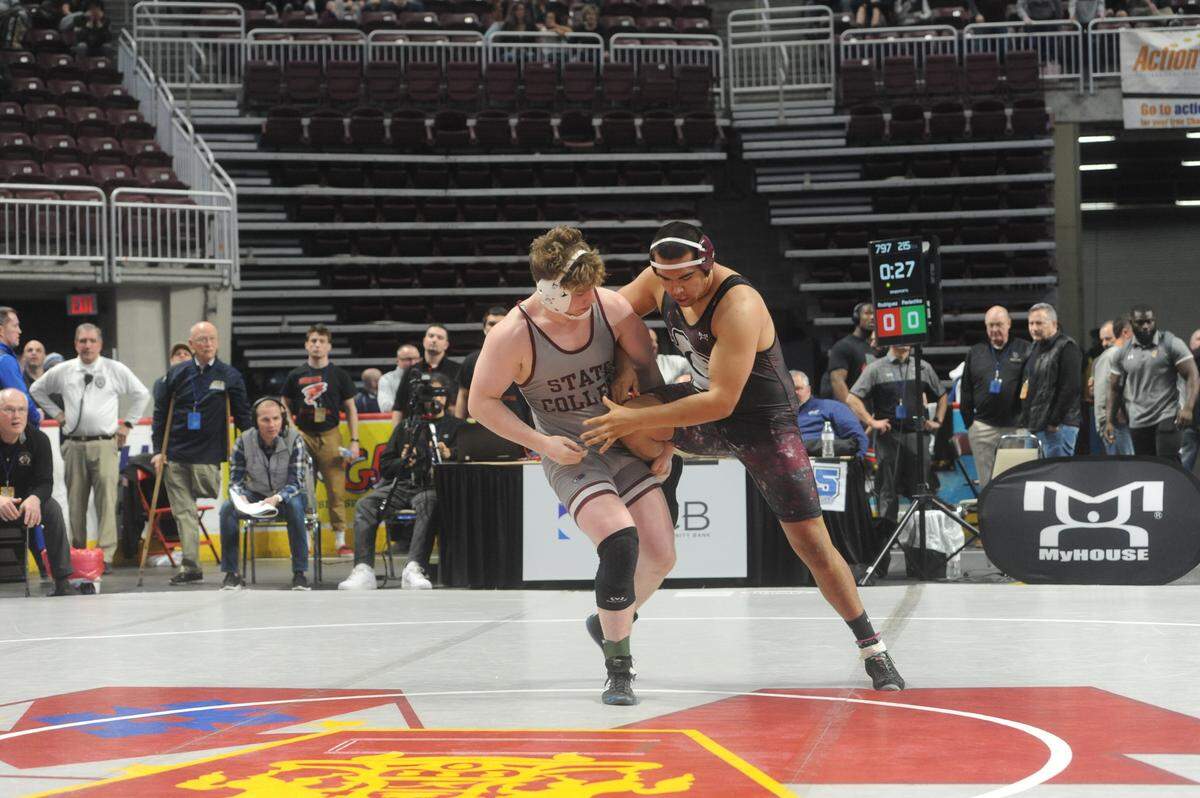 State College’s Nick Pavlechko attempts to take Gettysburg’s Samuel Rodriguez down in their 215-pound quarterfinals match of the PIAA Class 3A Championships on Friday, March 11, 2022 at Giant Center in Hershey. Pavlechko racked up a 12-1 major decision to reach the semifinals and secure his first PIAA medal.