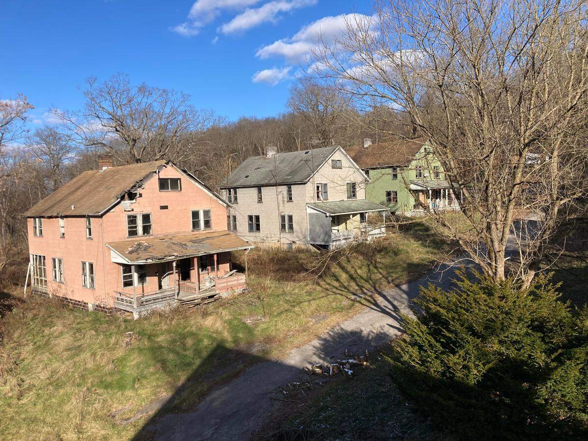Several houses in Yellow Dog Village, an abandoned town outside Kittanning, Pennsylvania.