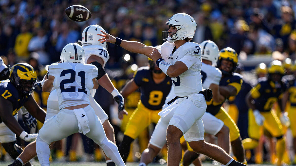Penn State quarterback Rocco Becht (3) throws against Michigan during the first half at Michigan Stadium in Ann Arbor on