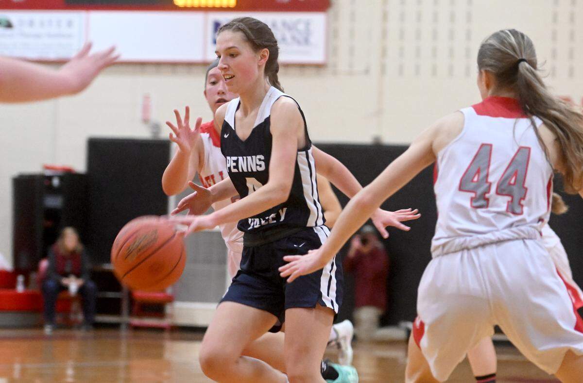 Penns Valley’s Ann-Marie McMurtrie dribbles down the court with the ball around Bellefonte defenders during the game on Monday, Jan. 23, 2023.