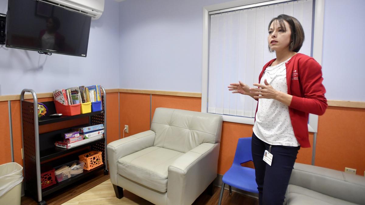 Kristina Taylor-Porter talks about the waiting room at the Children’s Advocacy Center and how it is a space for the child to play and feel comfortable in on Thursday, Dec. 20, 2018.