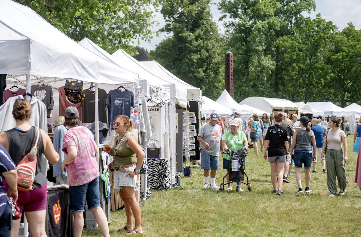 Visitors browse the booths at the People’s Choice Festival on the grounds of the Pennsylvania Military Museum in Boalsburg on Thursday, July 9, 2026.