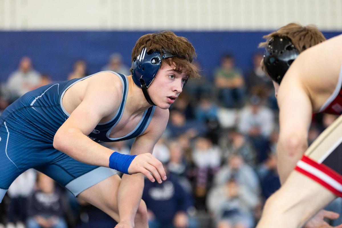 Penns Valley’s Conner Myers looking for a scoring opportunity against Bishop McCort’s Jack Silfies in their 121-pound bout of the Rams’ 59-6 loss in the District 6 Class 2A finals on Feb. 1 in Spring Mills. Myers topped Silfies, 7-3.