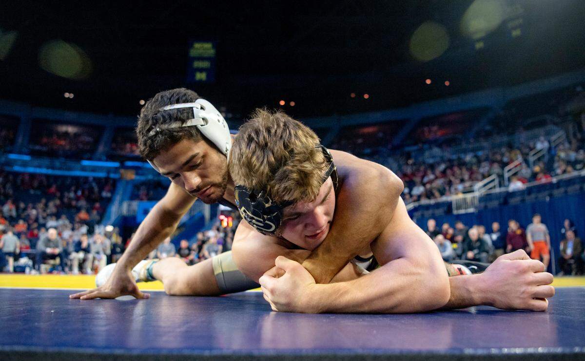Penn State’s Shayne Van Ness controls Purdue’s Jaden Reynolds in a 149 bout of the Big Ten wrestling championships at the Crisler Center on Saturday, March 4, 2023.