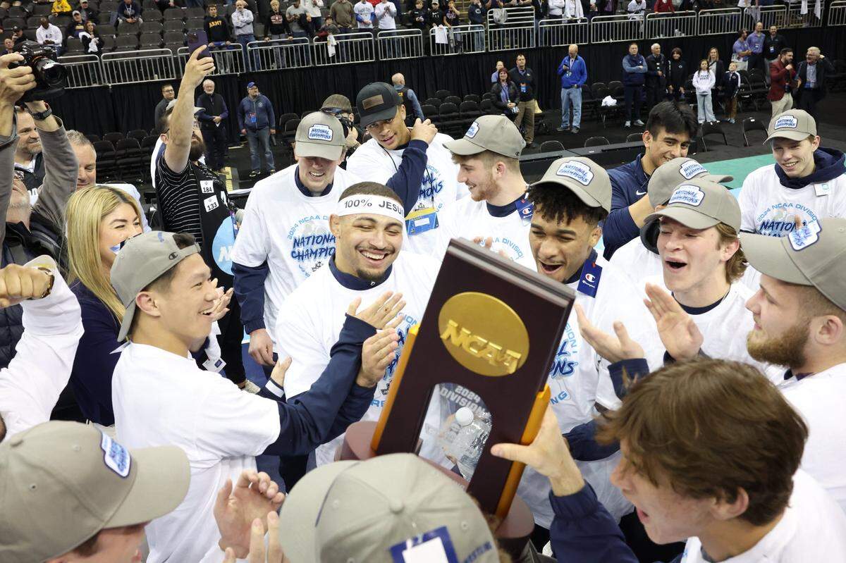 Mar 23, 2024; Kansas City, MO, USA;  The Penn State Nittany Lions celebrate after winning the NCAA Wrestling Title at the T-Mobile Center. Mandatory Credit: Reese Strickland-USA TODAY Sports