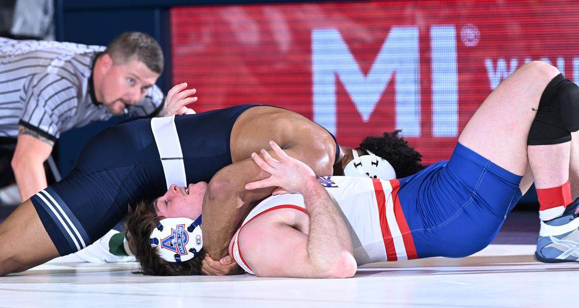 Penn State’s Carter Starocci pins American’s Lucas White at 184 lbs during Friday’s match at Rec Hall in State College. Penn State defeated American University, 50-3.