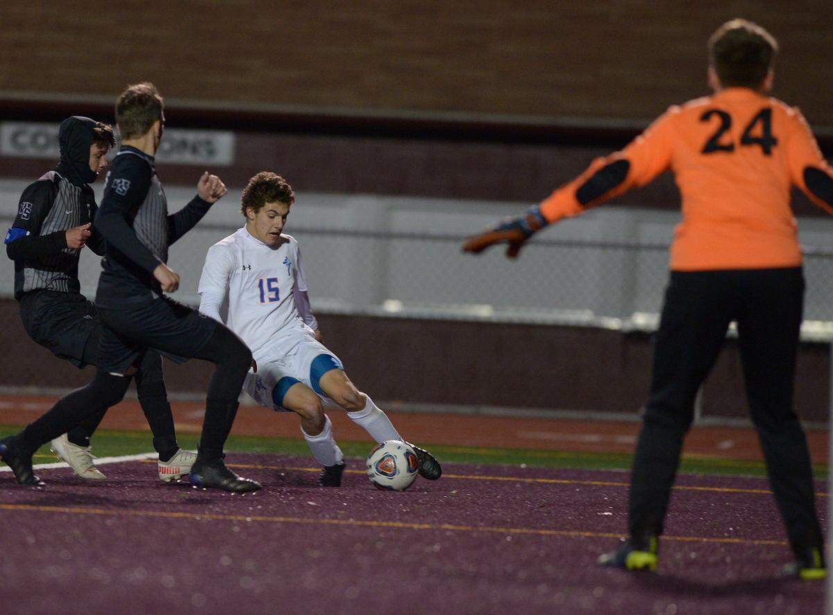 Saint Joseph’s Catholic Academy’s Sam Yangula takes a shot on West Shamokin’s goalie Nicky Atherton during the District 6 A championship Thursday at Altoona’s Mansion Park.