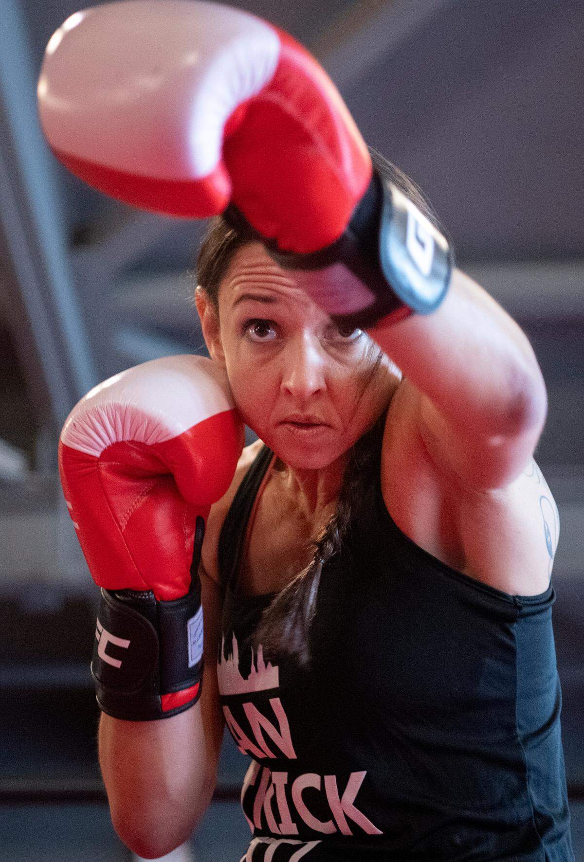 Elise Pone moves through a series of Muay Thai moves at Central PA Mixed Martial Arts on Thursday, July 7, 2022.