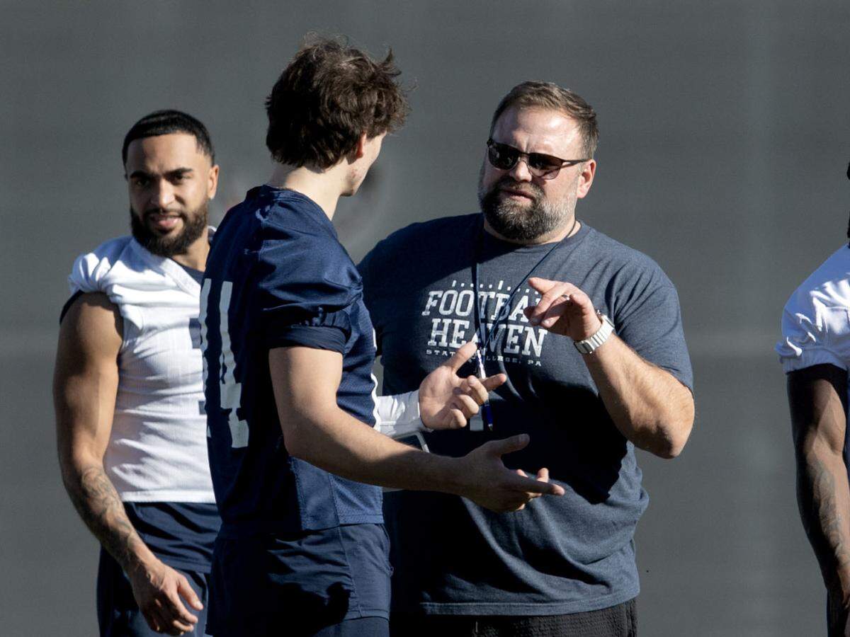 Penn State offensive coordinator Andy Kotelnicki talks with quarterback Jaxon Smolik during practice for the Fiesta Bowl on Sunday, Dec. 29, 2024 at Tempe Diablo Stadium.