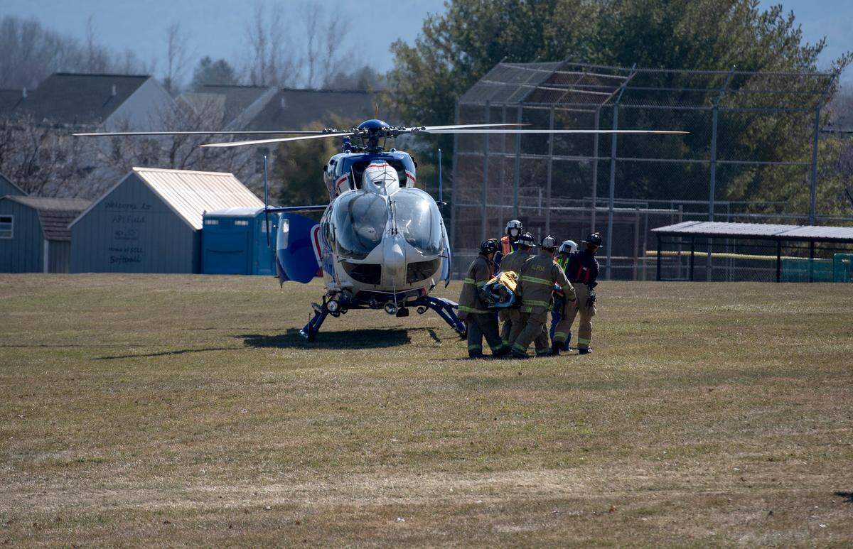 The Life Flight helicopter takes one patient from the scene of the a multi-vehicle accident at the intersection of West College Avenue and Science Park Road on Monday, March 22, 2021.