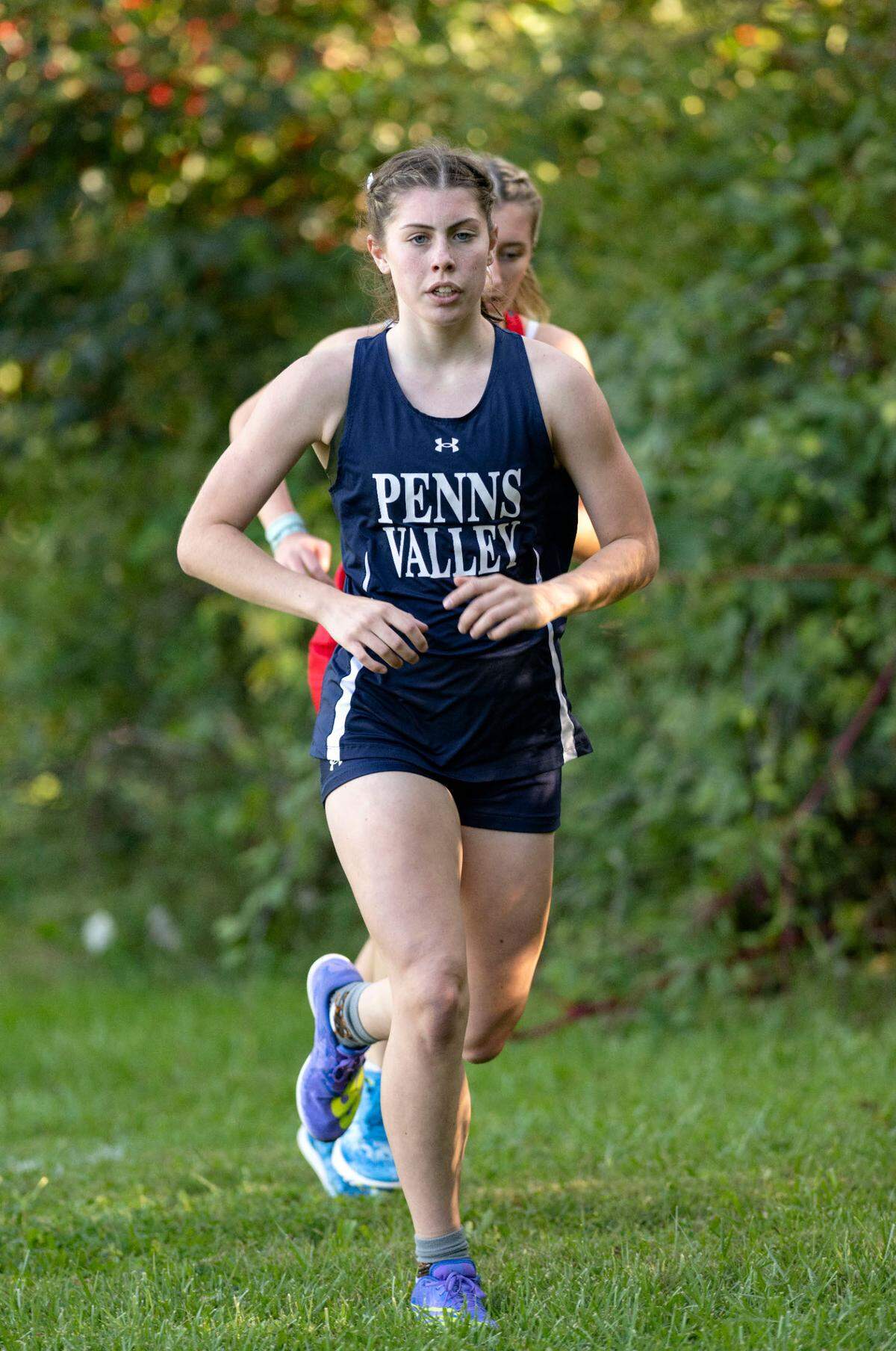 Penns Valley’s Ayva Fetterolf makes her way up a hill during the cross country meet against Bellefonte on Wednesday, Sept. 27, 2023 at Governor’s Park.