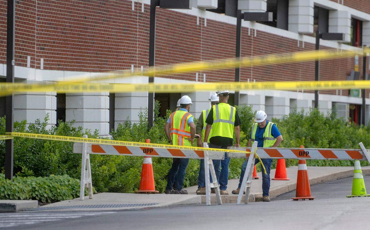 Eisenhower Road and the Eisenhower Parking Deck were closed as crews investigated a sinkhole on Wednesday, Aug. 16, 2023.
