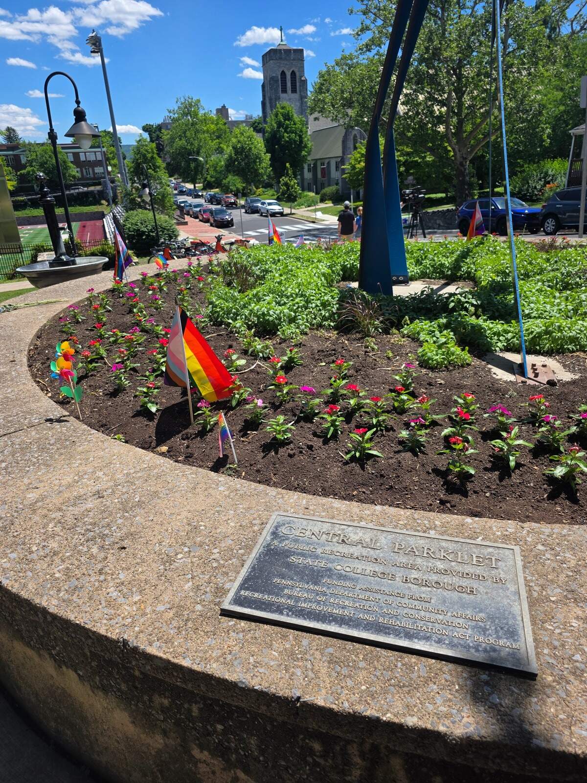 Pride flags sit in the garden at Sidney Friedman Park on June 13, 2026