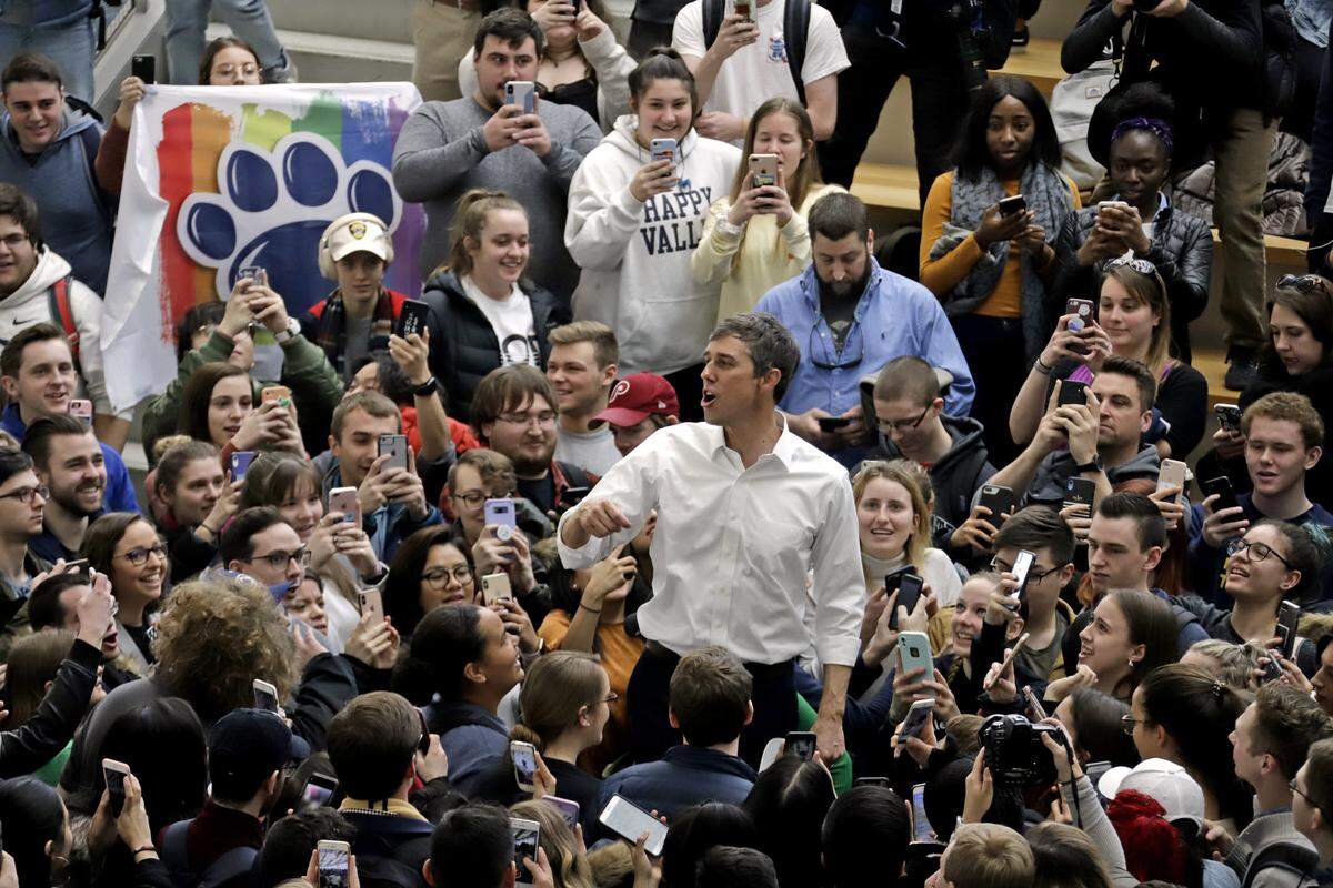 Democratic presidential candidate Beto O’Rourke, center, thanks students as he leaves an at the HUB-Robeson Center on the Penn State campus in State College, Pa., on Tuesday, March 19, 2019.