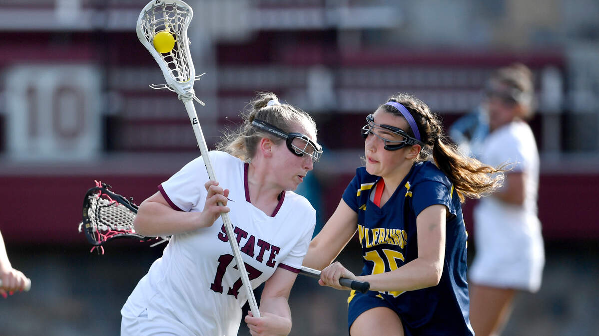 A Mount Lebanon defender can’t stop State College’s Leah Moyer as she advances down the field in the game on Tuesday, June 1, 2021.