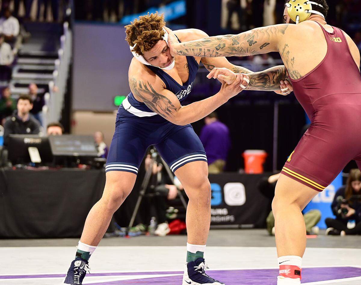 Penn State’s Greg Kerkvliet battles with Minnesota’s Gable Steveson in their 285-pound finals match of the Big Ten championships on Sunday inside Welsh Ryan Arena in Evanston, Ill. Steveson defeated Kerkvliet, 10-3.