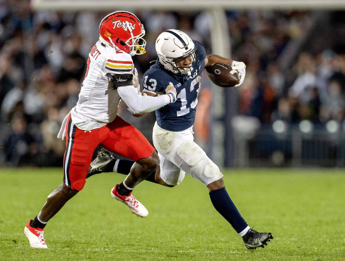 Maryland’s Jakorian Bennett tries to stop Penn State running back Kaytron Allen during the game on Saturday, Nov. 12, 2022.