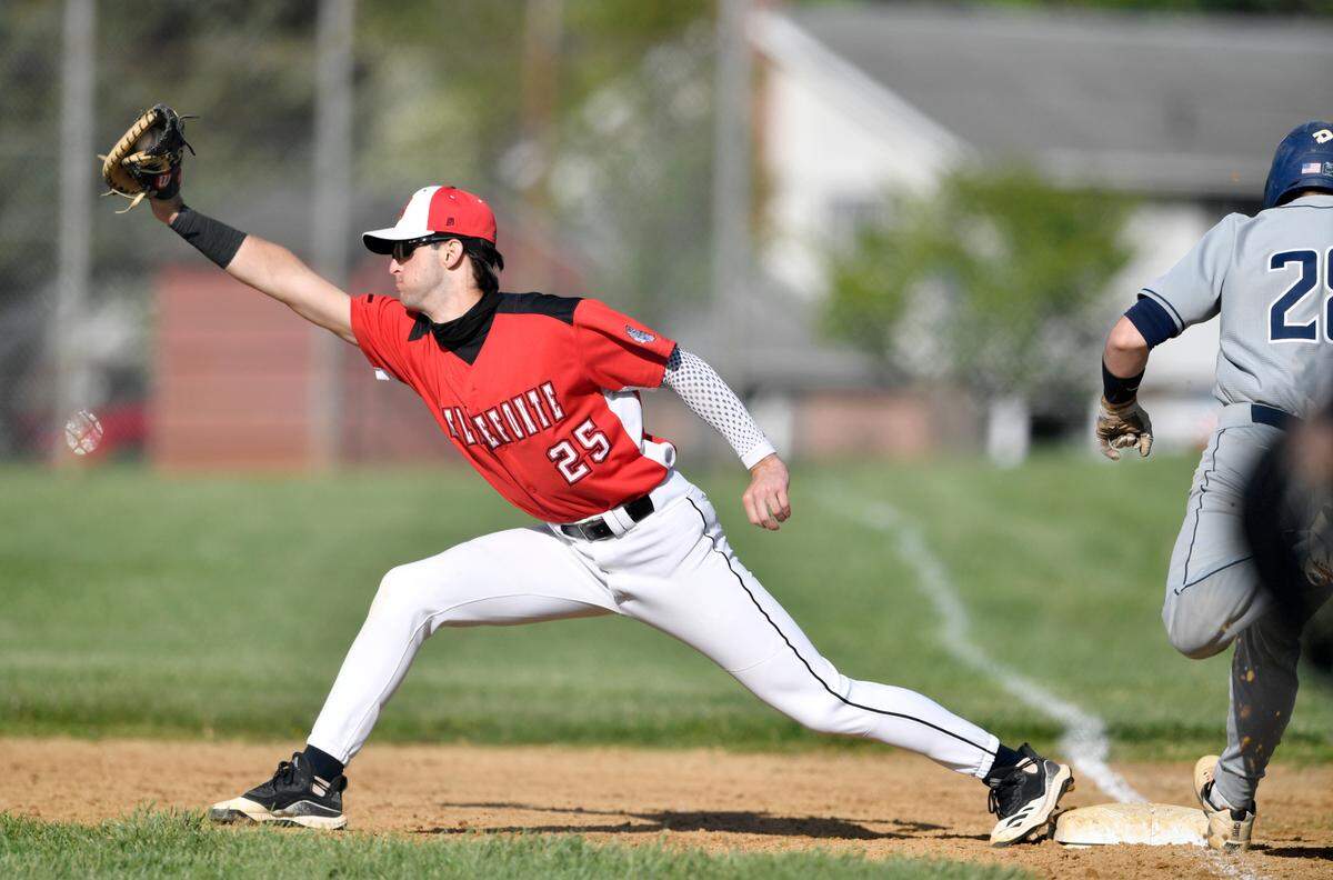 Bellefonte’s Bobby Marsh reaches to make the catch for Philipsburg-OsceolaÕs Nate Gustkey to be out during the game on Monday, May 10, 2021.