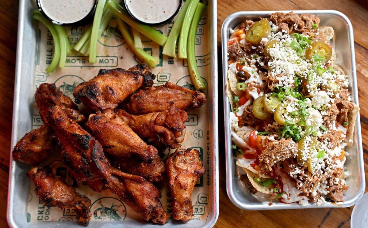 Smoked chicken wings and Dumpster Nachos at Bill Pickles Tap Room on Wednesday, July 17, 2024.