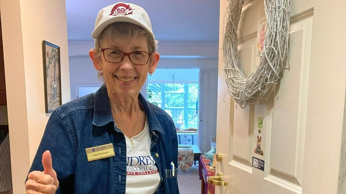 The Village at Penn State resident Joan Bouchard takes a “recycling buddy case” with her to educate new residents about recycling.