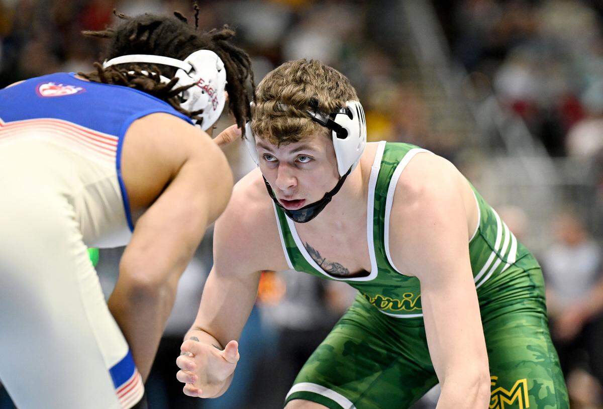 George Mason’s Malachi Duvall, who is a Penns Valley graduate, faces American’s Caleb Campos in a 184-pound consolation bout at the NCAA Wrestling Championships on Friday, March 20, 2026.