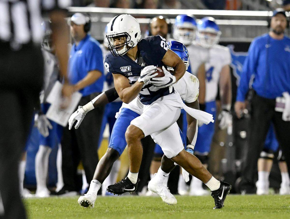 Penn State cornerback John Reid intercepts the ball from Buffalo and runs it back for a touchdown in the third quarter of the game on Saturday Sept. 7, 2019.