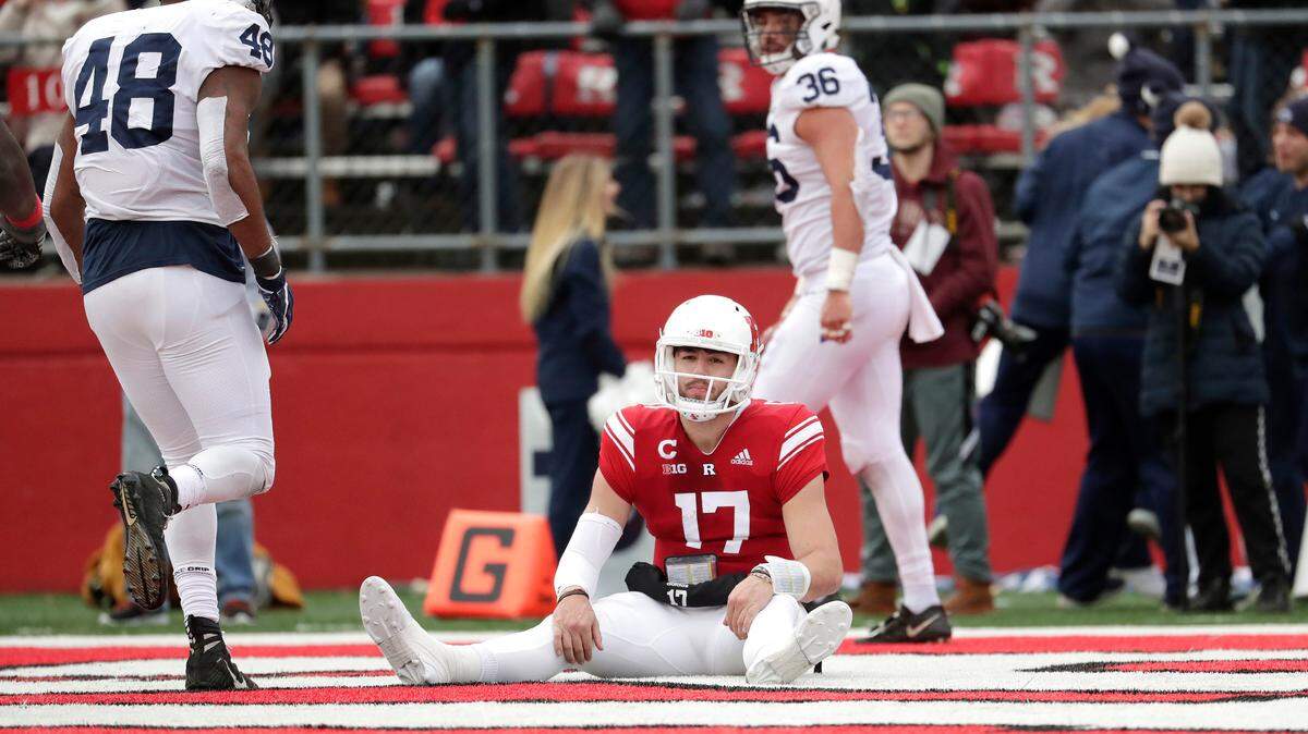 Rutgers quarterback Giovanni Rescigno (17) sits on the end zone after dropping a pass on a fourth down play against Penn State during the second half of an NCAA college football game, Saturday, Nov. 17, 2018, in Piscataway, N.J. (AP Photo/Julio Cortez)