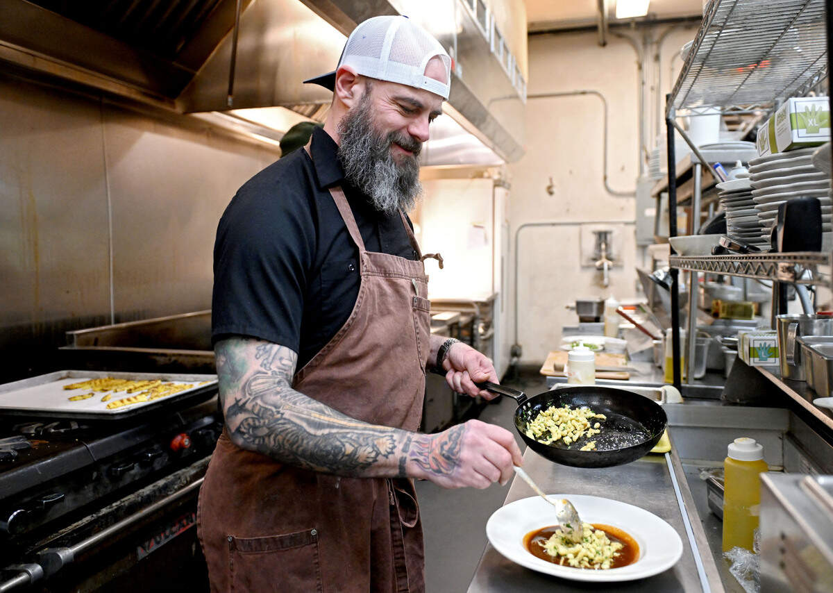 Elk Creek Cafe + Aleworks Chef Jonathan Forshey places the spaetzel for the Poe Paddy Porter braised beef on Friday, Jan. 24, 2025.