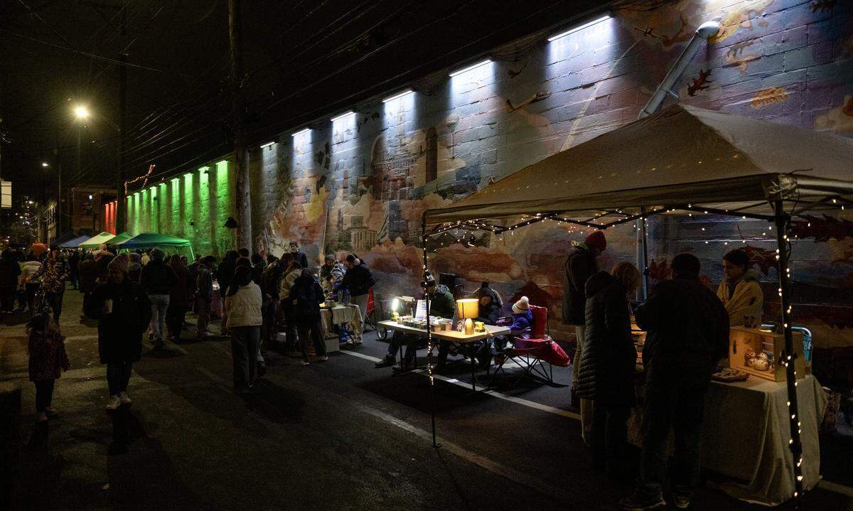 Young art vendors fill Calder Way during Light Up Night on Thursday, Nov. 20, 2025. 