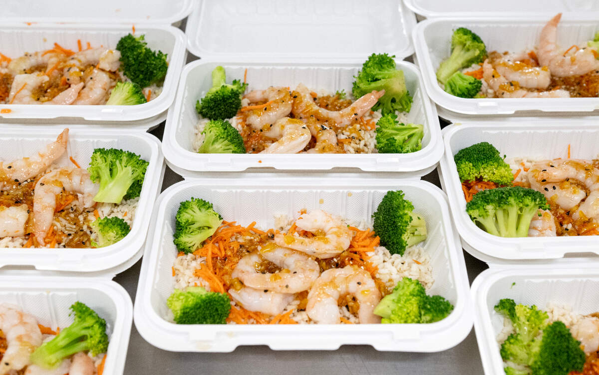 Orange ginger shrimp served over brown rice with broccoli and carrots by Belle City Bites on Monday, June 9, 2025.