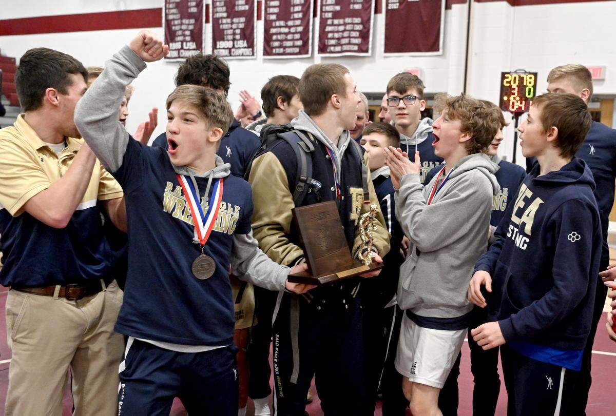 Bald Eagle Area wrestling celebrates being the District 6 2A champions and coach Ron Guenot winning coach of the year on Saturday, Feb. 18, 2023.