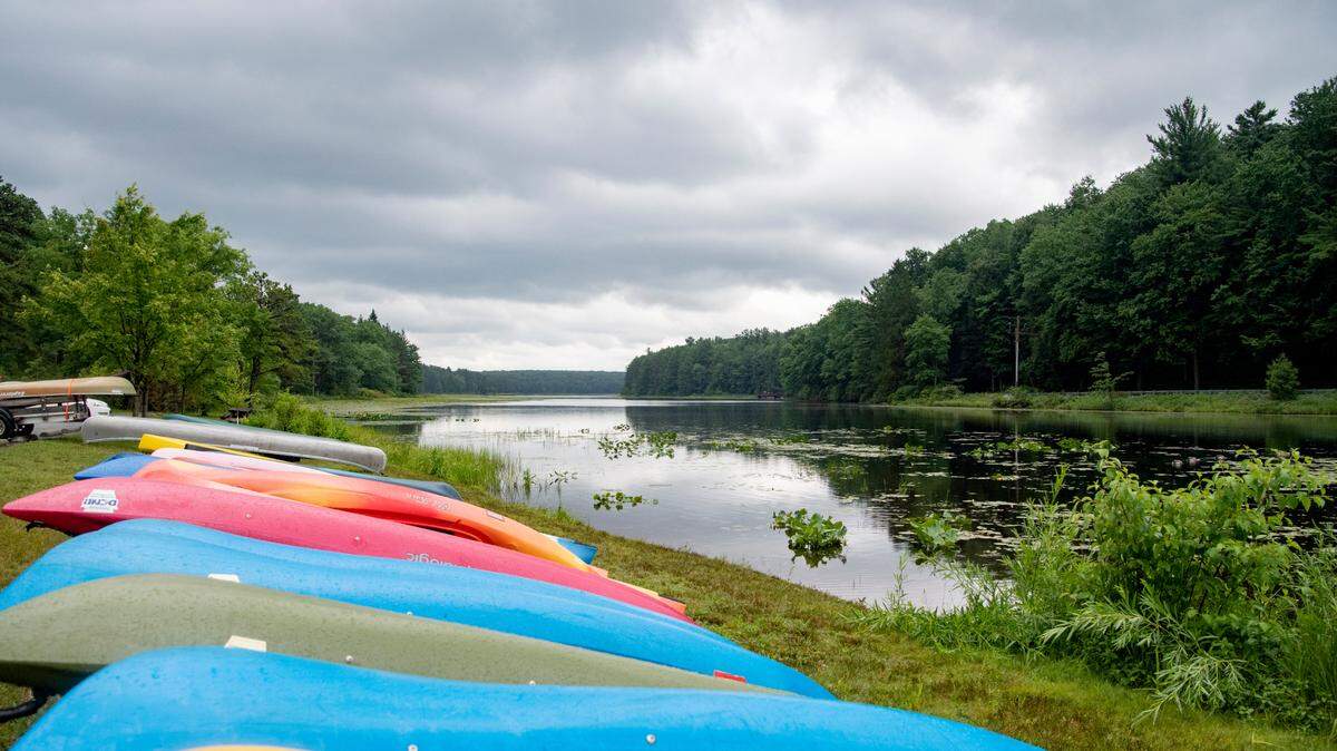 Kayaks lined up at Black Moshannon State Park on July 11, 2020. The lake was closed Thursday because of elevated bacteria levels.
